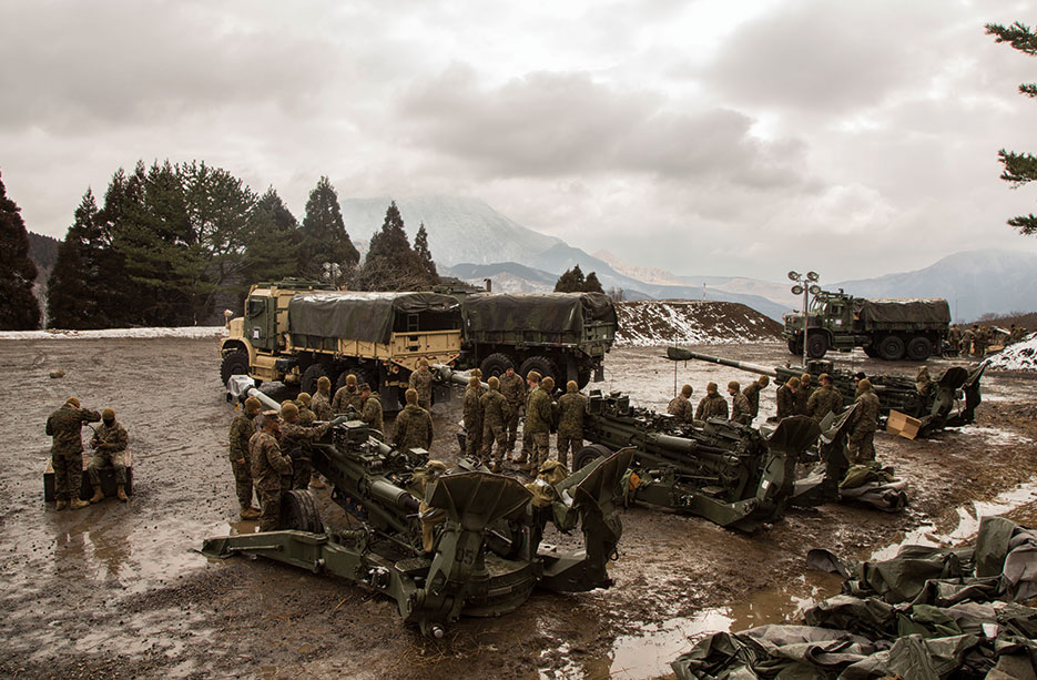 Marines and Sailors with Alpha Battery, 1st Battalion, and 12th Marines attached to Alpha Battery, 3D Battalion, make final preparations before heading to field in Hijudai Maneuver Area, Japan, February 24, 2017 (U.S. Marine Corps/Christian J. Robertson)