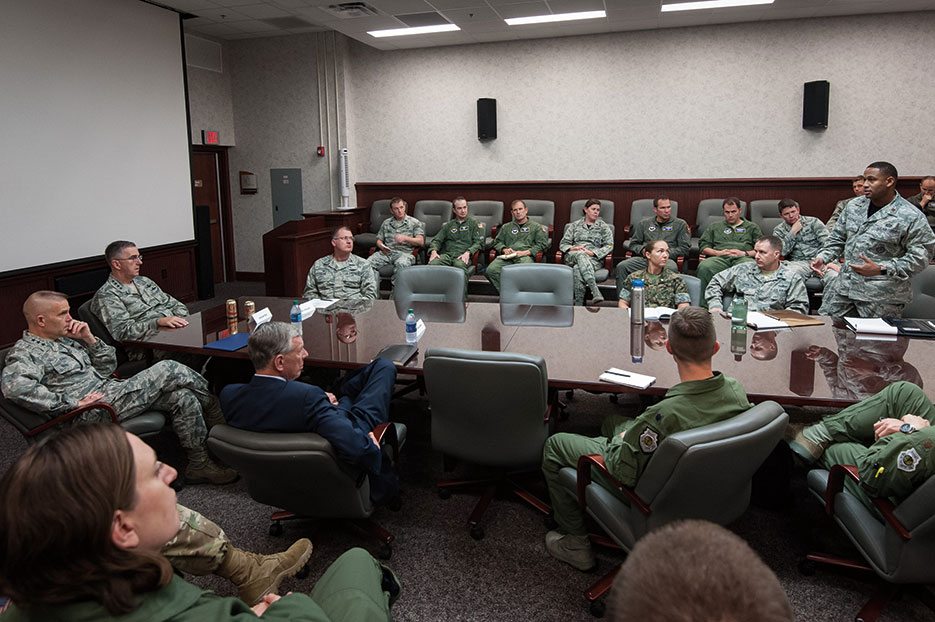 SAt head of table, General John E. Hyten, commander, U.S. Strategic Command, listens to students of Air University’s Air War College, Blue Horizons, and School of Advanced Air and Space Studies, May 5, 2017, at Maxwell Air Force Base (U.S. Air Force/Melanie Rodgers Cox)