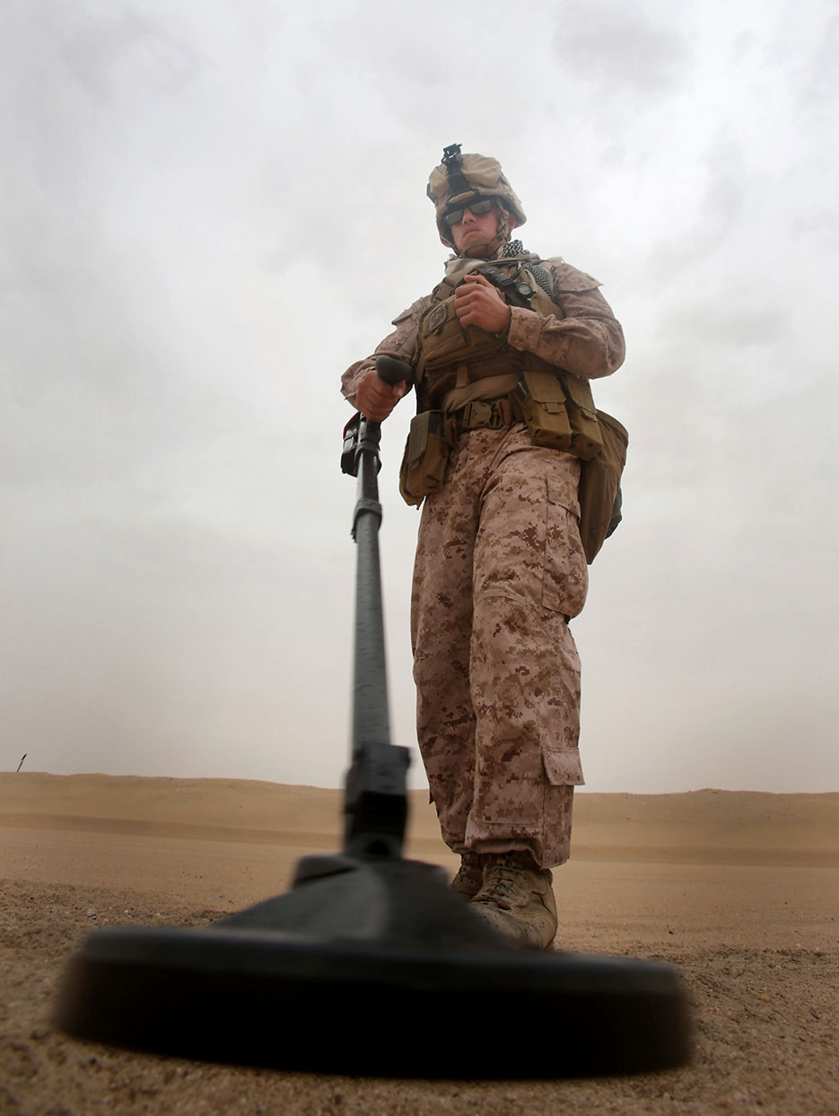 Marine sweeps for signs of improvised explosive devices during training aboard Camp Buehring, Kuwait, November 1, 2013 (U.S. Marine Corps/Christopher O’Quin)