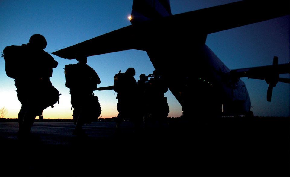 Army Reserve Soldiers with U.S. Army Civil Affairs and Psychological Operations Command (Airborne) board CASA 212 aircraft during night airborne operation at Camp Mackall Airfield, North Carolina, March 12, 2013 (U.S. Army/Jacquelyn R. Slaughter)