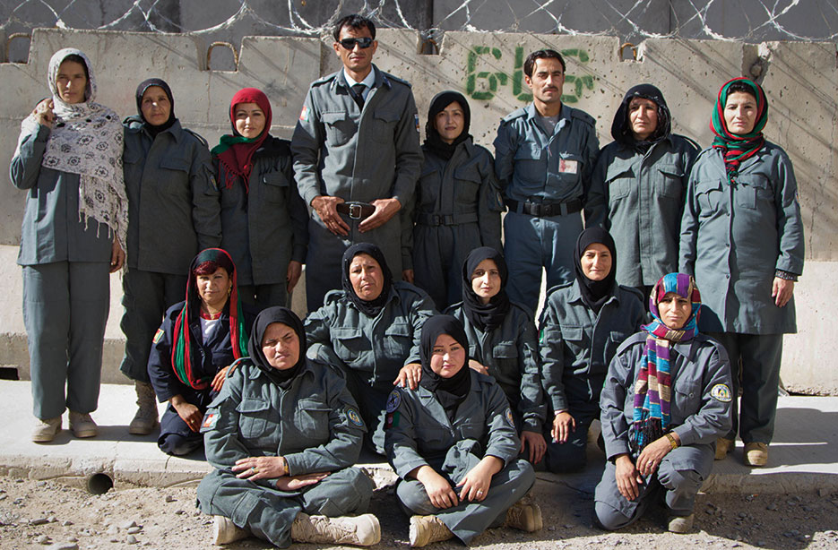 Afghan National Police recruits with their instructors at Joint Regional Afghan National Police Center, Kandahar, Afghanistan, December 2013 (U.S. Army/Mariah Best)